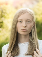 Woman with natural beauty look and no makeup. Sensual woman with blond long hair. Albino girl with blue eyes and white skin. Natural beauty and skincare