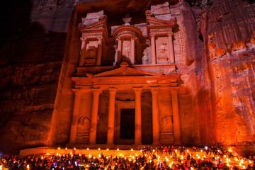 The Treasury (Al Khazneh) of Petra Ancient City over the night, Jordan.
