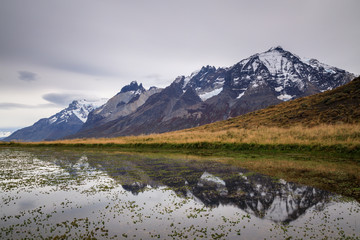 Torres del Paine mountain range reflecting in a lake