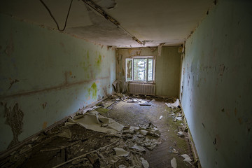 An old, desolated, damaged house.