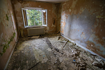 An old, desolated, damaged house.