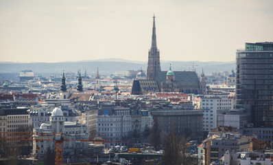 Fototapeta premium Beautiful super-wide angle aerial view of Vienna, Austria, with old town Historic Center and scenery beyond the city, shot from ferris wheel in Prater Park