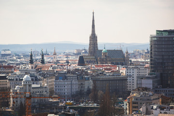 Fototapeta premium Beautiful super-wide angle aerial view of Vienna, Austria, with old town Historic Center and scenery beyond the city, shot from ferris wheel in Prater Park