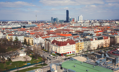 Beautiful super-wide angle aerial view of Vienna, Austria, with old town Historic Center and scenery beyond the city, shot from ferris wheel in Prater Park