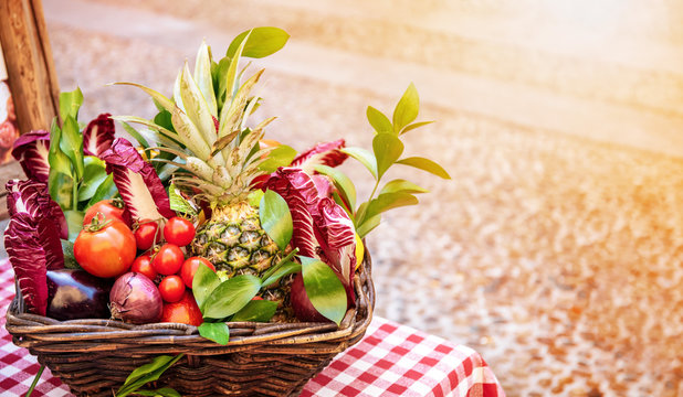 Basket of fruit and vegetables with copy space