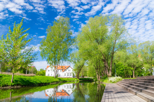 View for Lyna river in central park in Olsztyn in Poland.