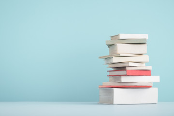 Stack of mini old books.