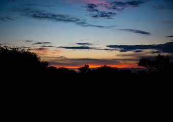 Sun rise over the game reserve Elephant Sands in Botswana during summer