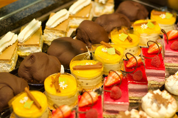 Berry creamy cakes on the counter