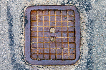 Hatch cover, city drain on the road, city sewerage