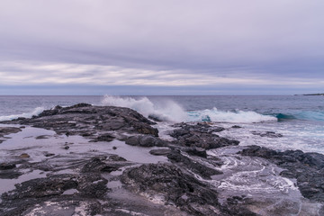 Waves Breaking on Lava Rock