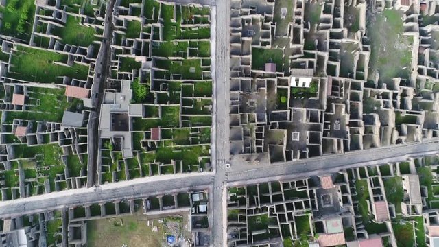 Aerial top down view of Pompeii Via dell Abbondanza Pompeii was an ancient Roman city near modern Naples Italy it was mostly destroyed and buried under volcanic ash and pumice of Mount Vesuvius 4k