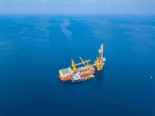 Aerial View of Tender Drilling Oil Rig (Barge Oil Rig) in The Middle of The Ocean