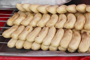 Grilled banana on stove at street food