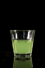 A glass with absinthe
