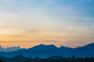 Silhouette mountain sunrise with colorful sky cloud