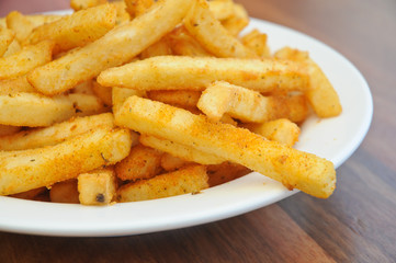 Close up of golden spice french fries