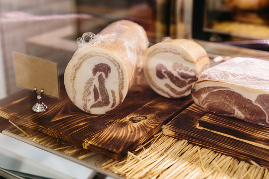 Pancetta is an Italian bacon made of pork belly meat, that is salt cured and spiced with black pepper.
