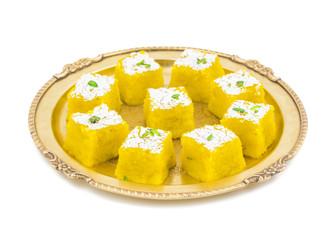 Indian Sweet Kopra pak Also Know as Barfi is a Gujarati style of making coconut burfi. This sweet or mithai is made from freshly grated coconut, sugar, milk and mawa.
