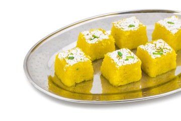 Indian Sweet Kopra pak Also Know as Barfi is a Gujarati style of making coconut burfi. This sweet or mithai is made from freshly grated coconut, sugar, milk and mawa.