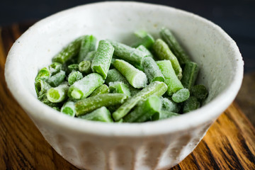 Green beans. Fresh frozen beans for salad, cooking or raw vegan food. Vegetarian and healthy
