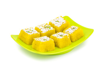 Indian Sweet Kopra pak Also Know as Barfi is a Gujarati style of making coconut burfi. This sweet or mithai is made from freshly grated coconut, sugar, milk and mawa.