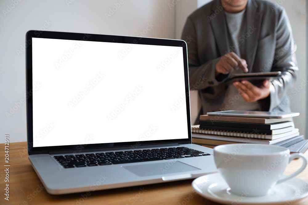 Poster laptop with blank screen on table. workspace background new project on laptop computer with blank co