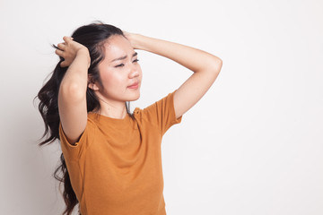 Fototapeta premium Stressed young Asian businesswoman scream out.