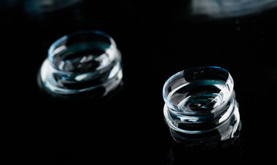 Two contact lenses with reflections