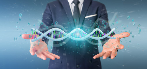 Businessman holding a 3d rendering data coded Dna with binary file around