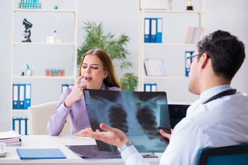 Doctor examining x-ray images of patient