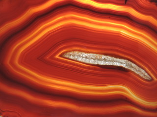 Detail view through a red mineral