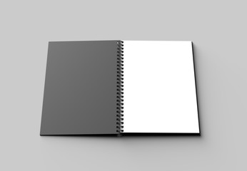 Spiral binder notebook mock up with black cover isolated on soft gray background. 3D illustrating.
