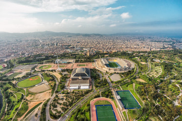 Obraz premium Barcelona aerial wide angle panorama, Anella Olimpica sport complex with city skyline , Spain
