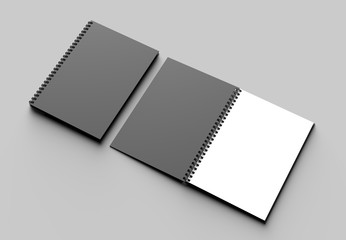 Spiral binder notebook mock up with black cover isolated on soft gray background. 3D illustrating.