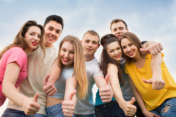 Group of happy young people laughing