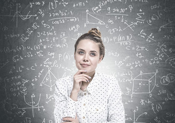 Fototapeta premium Smiling young woman dreaming, science
