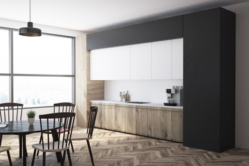 Gray kitchen and dining room interior side view