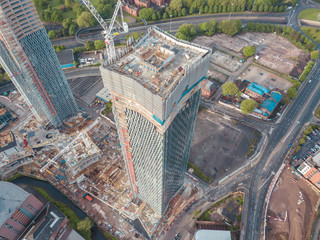 Manchester City Centre Drone Aerial View Above Building Work Skyline Construction Blue Sky Summer...