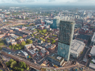 Fototapeta na wymiar Manchester City Centre Drone Aerial View Above Building Work Skyline Construction Blue Sky Summer Beetham Tower Deansgate.