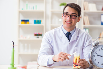 Young dentist working in the dentistry hospital