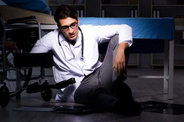 Doctor working night shift in hospital after long hours