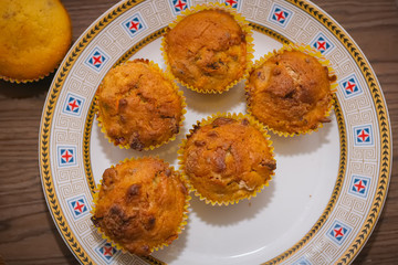 muffin cakes on a traditional patterned plate