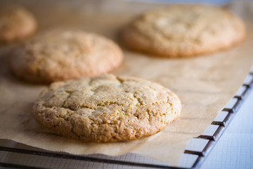 Freshly baked peanut butter cookies on cooling rack