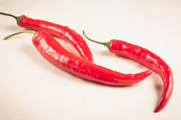 fresh red chili pepper/fresh red chili pepper on a white background. selective focus