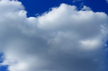 Background relief picturesque fluffy cloud on blue sky