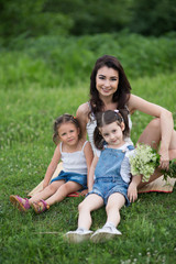 woman and children in nature