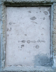 Painted weathered stone texture in a frame form. Architectural element. Close up view, backdrop