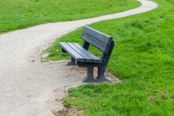 Blue Wooden Bench With Gravel Path
