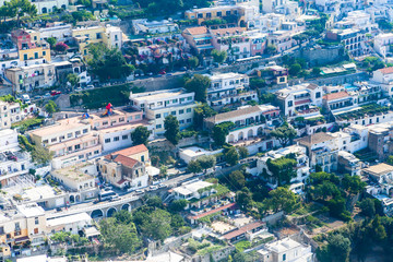 Fototapeta na wymiar View of Positano town at Amalfi coastline. Colorful houses along the sea coast, Italy